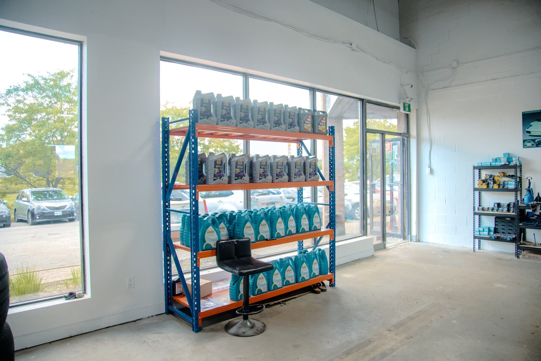 Premium synthetic motor oils and certified automotive fluids showroom display